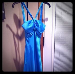 Floor length formal dress with a small train